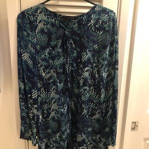 Long sleeve stylish dress in size medium.